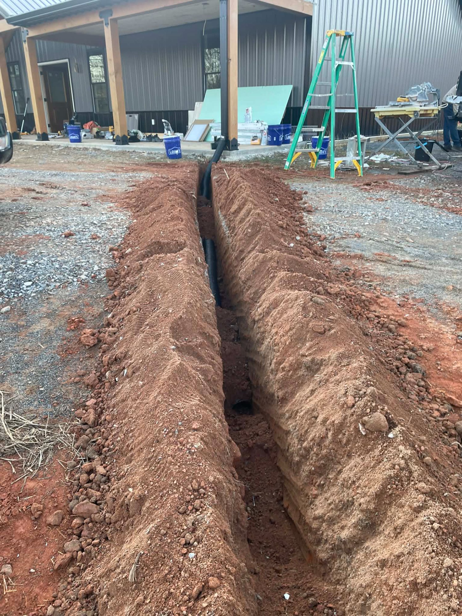 Residential drainage trenching — Red Line Grading LLC